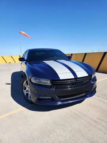 2016 Dodge Charger  Charger in front of Clock Tower Mall Used car business