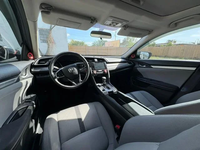 2017 Honda Civic  Civic in front of Clock Tower Mall Used car business